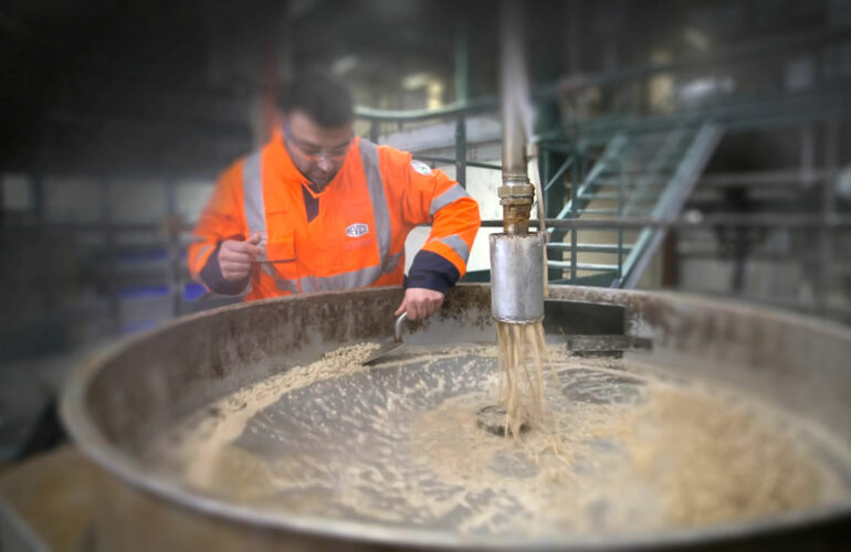 A REVICO employee harvests tartaric acid from Cognac stillage
